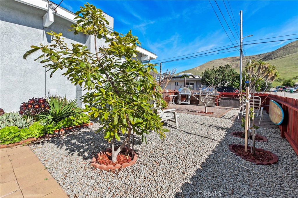 3201 Tide Avenue Morro Bay, CA 93442 - Photo 21 of 30 a view of a chairs and table in the patio