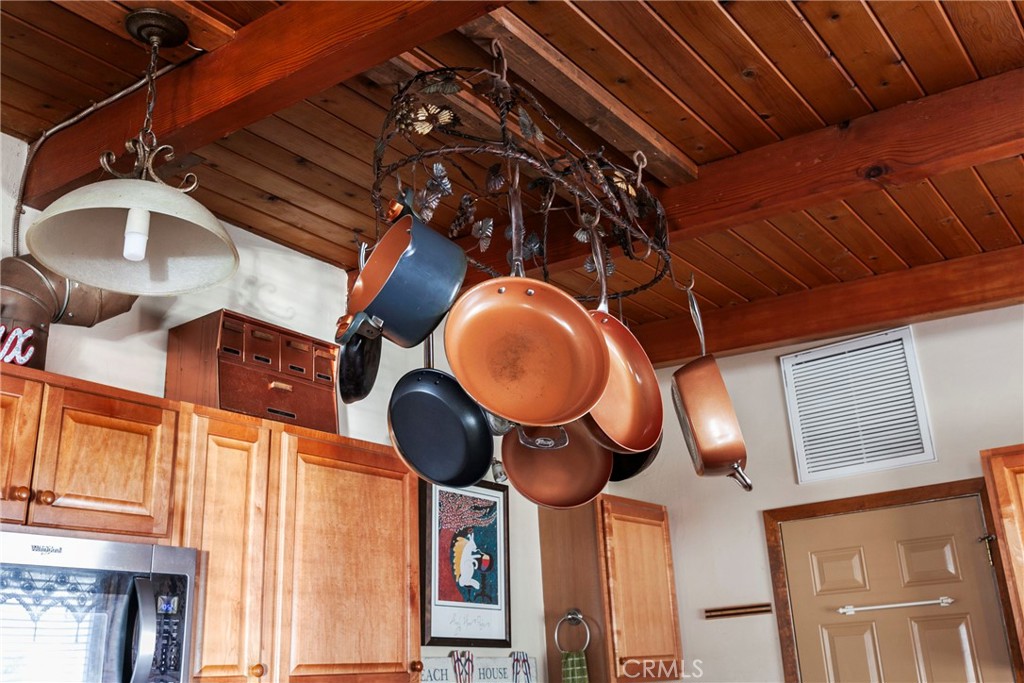 3201 Tide Avenue Morro Bay, CA 93442 - Photo 10 of 30 a lamp on a wall next to a building