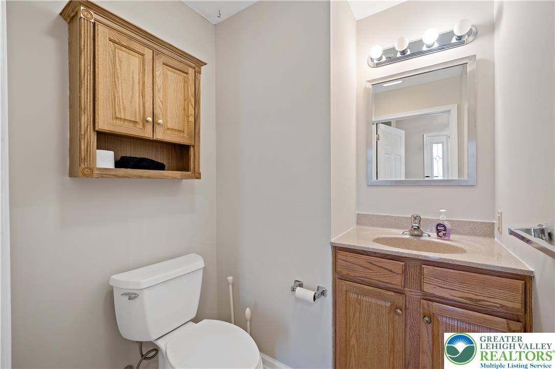 1300 Upstream Farm Road Easton, PA 18040 - Photo 23 of 29 a bathroom with a toilet sink and mirror