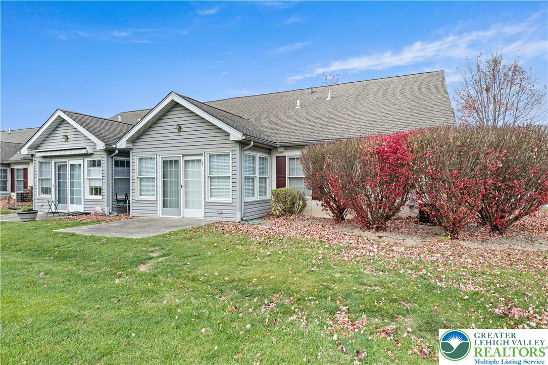 1300 Upstream Farm Road Easton, PA 18040 - Photo 28 of 29 a front view of a house with a yard and porch