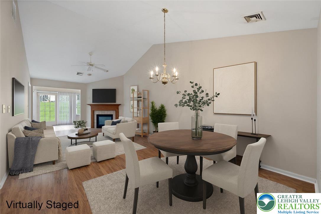 1300 Upstream Farm Road Easton, PA 18040 - Photo 5 of 29 a living room with furniture a chandelier and a table