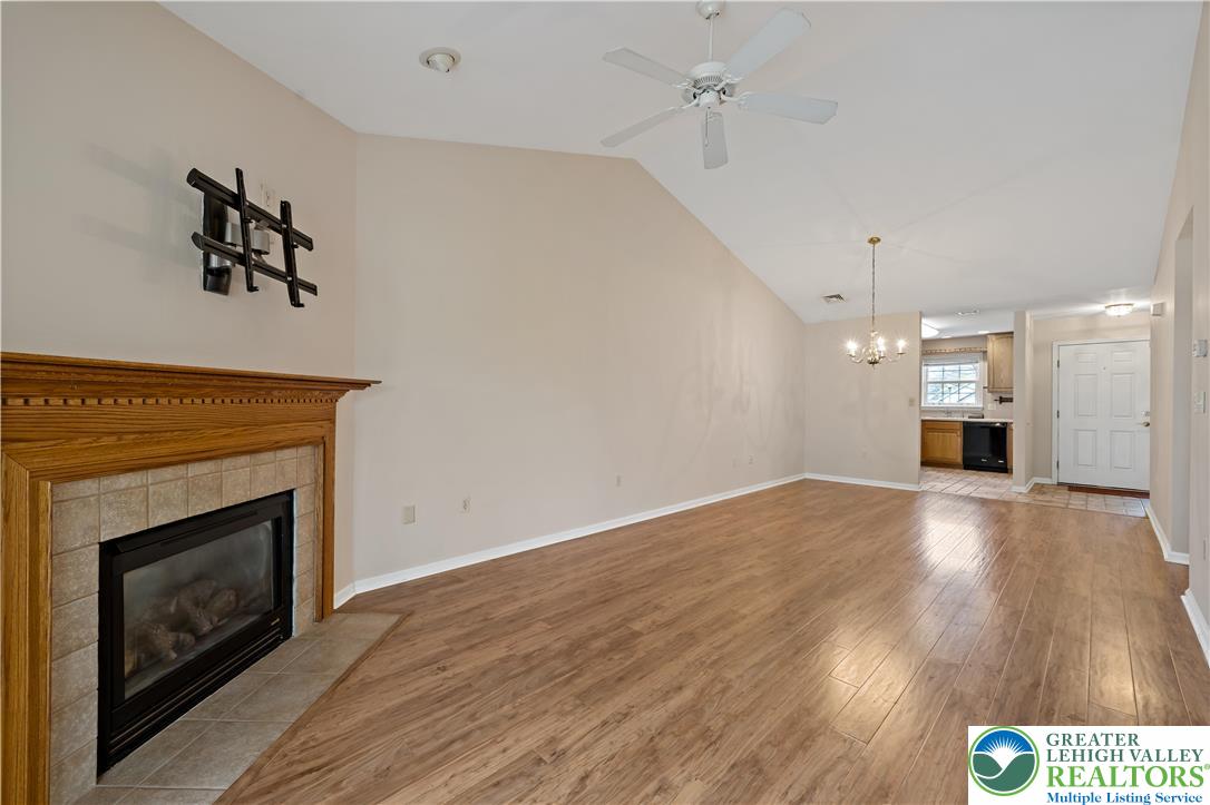 1300 Upstream Farm Road Easton, PA 18040 - Photo 8 of 29 a view of empty room with a fireplace and wooden floor