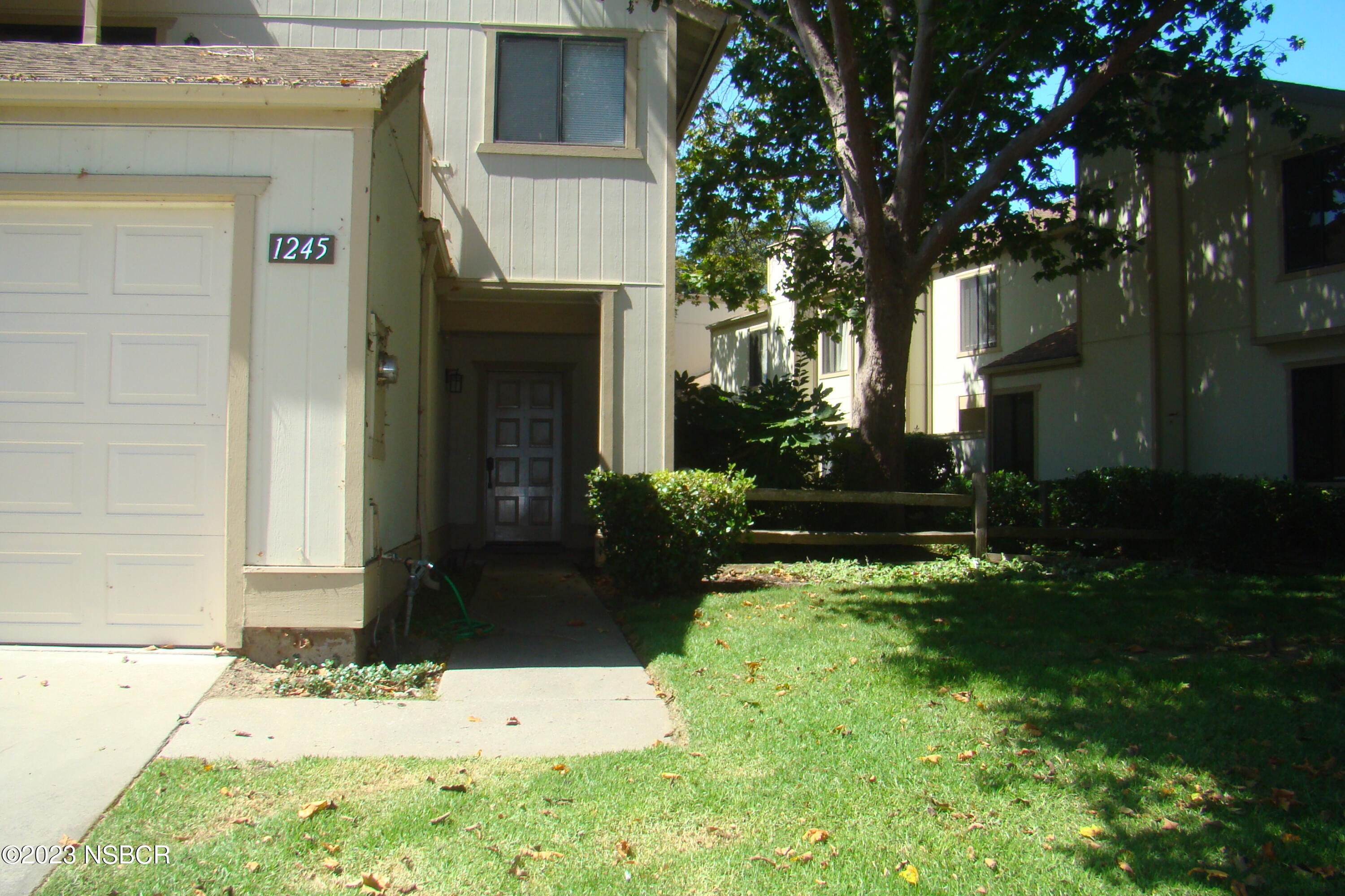1245 Riverside Drive Lompoc, CA 93436 - Photo 2 of 16 front view of a house with a yard
