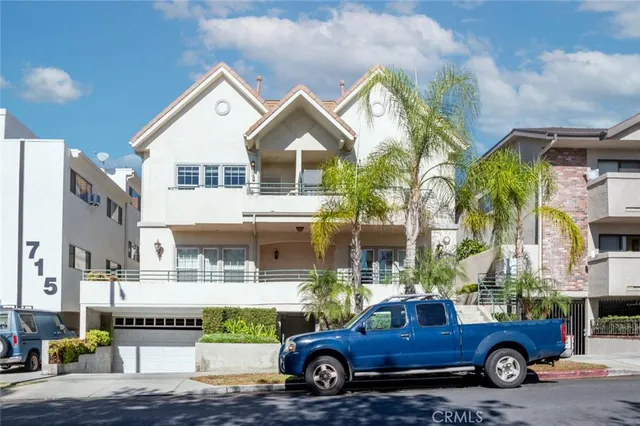 a car parked in front of a building