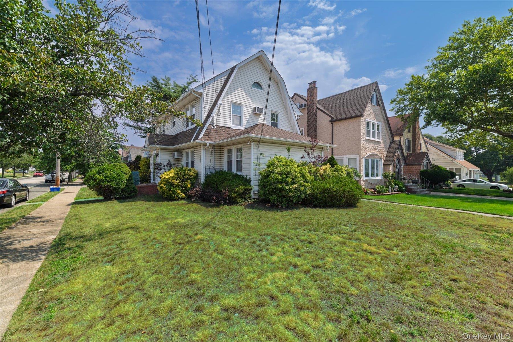 59 Hampton Road Lynbrook, NY 11563 - Photo 2 of 21 Side View of the House