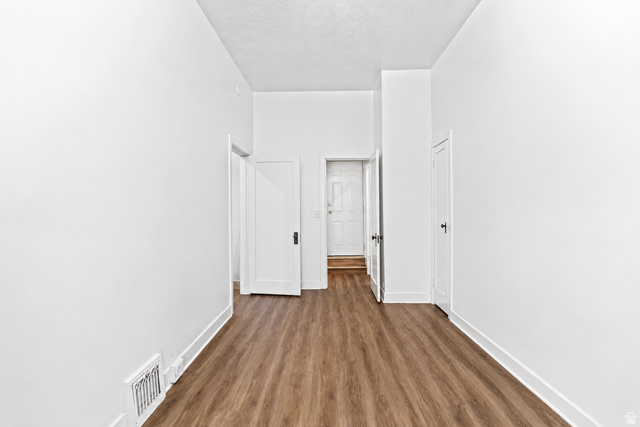 69 South Main Street Manti, UT 84642 - Photo 22 of 44 Entryway featuring wood-finish flooring and white baseboards