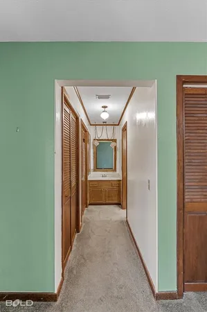 a view of a hallway with entryway