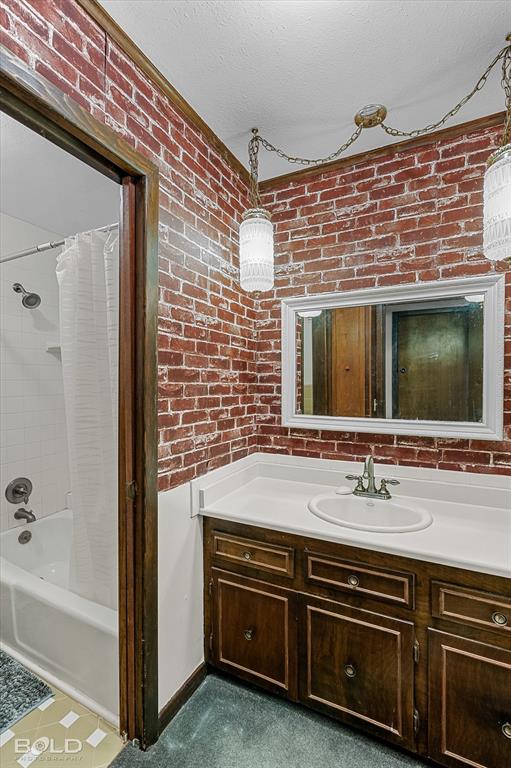 447 Burrow Lane Cotton Valley, LA 71018 - Photo 20 of 39 a bathroom with a sink and a bathtub