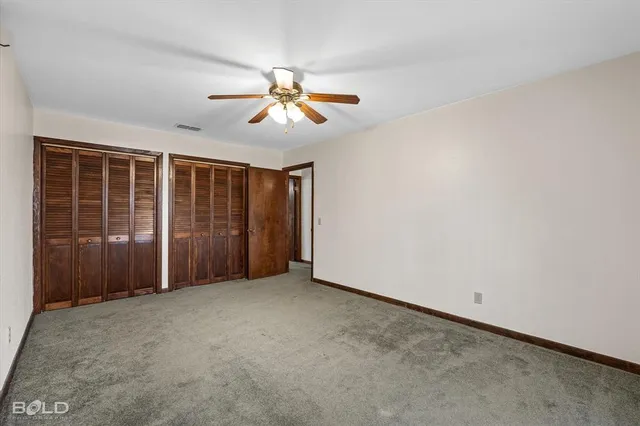 a bathroom with a sink double vanity and a bathtub