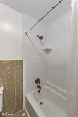 a bathroom with a bathtub