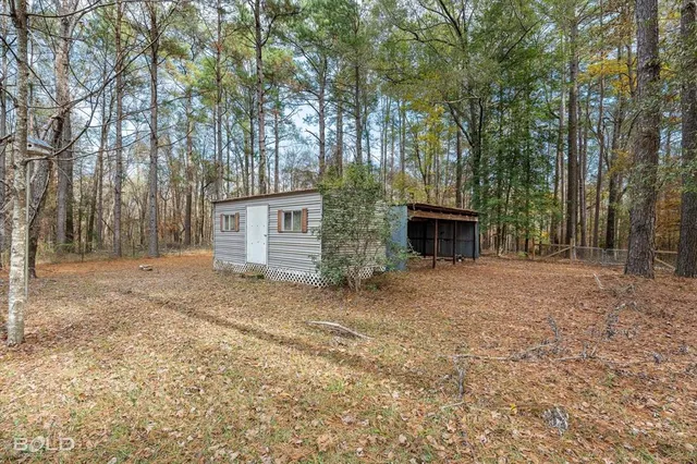 a house view with a garden space