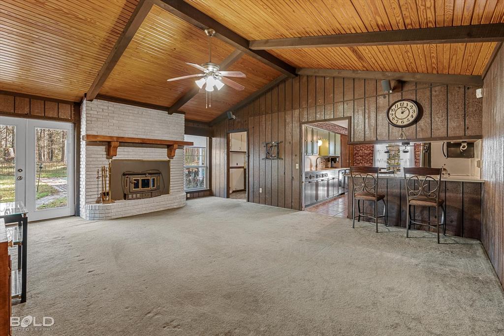 447 Burrow Lane Cotton Valley, LA 71018 - Photo 5 of 39 a view of a livingroom with furniture and a fireplace