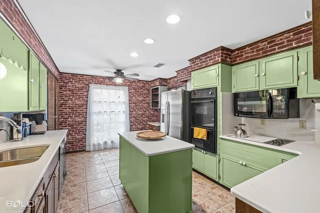 a bathroom with a sink a toilet and a bathtub