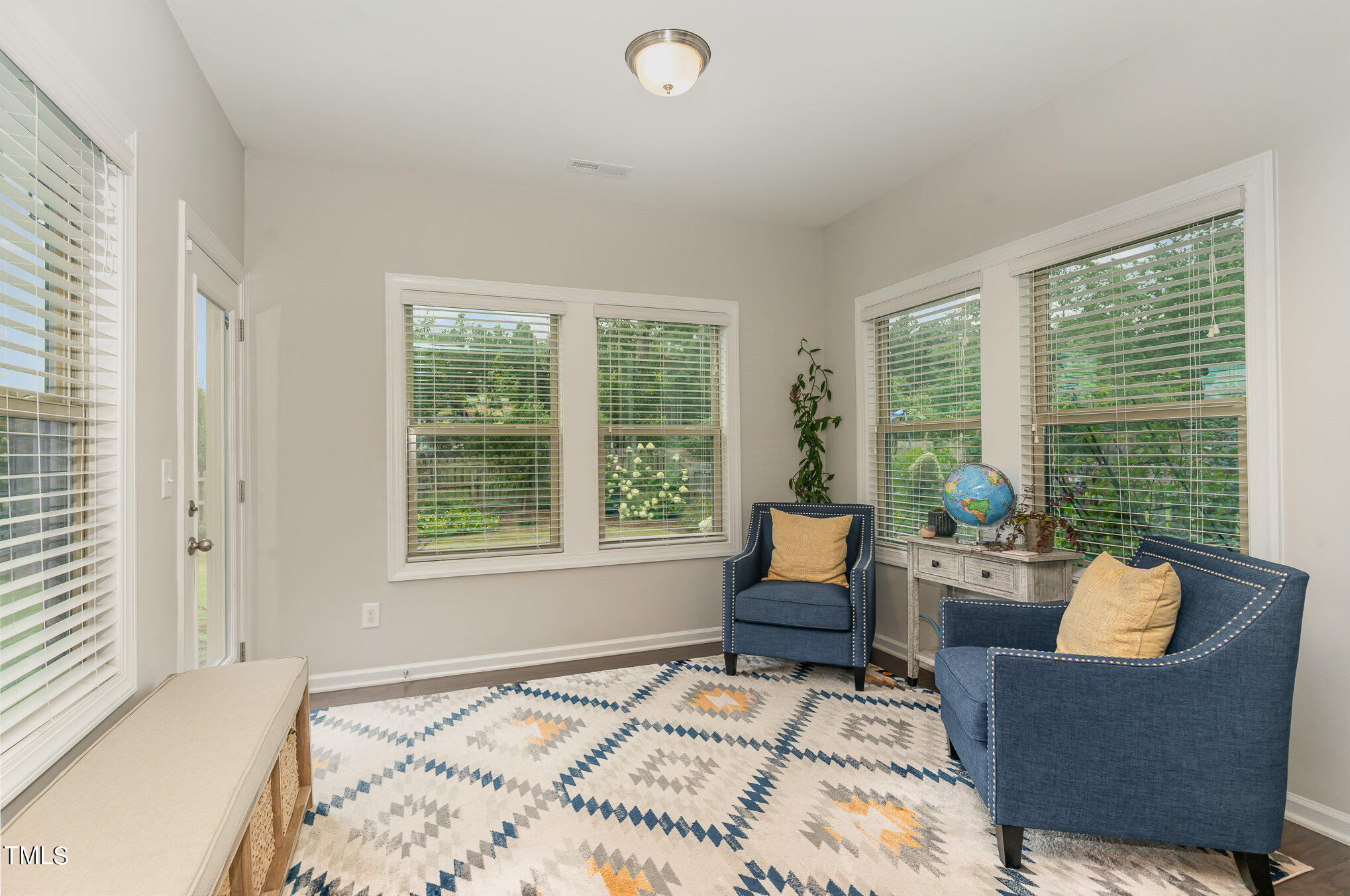 3405 Barn Road Apex, NC 27502 - Photo 18 of 38 a living room with furniture and a window