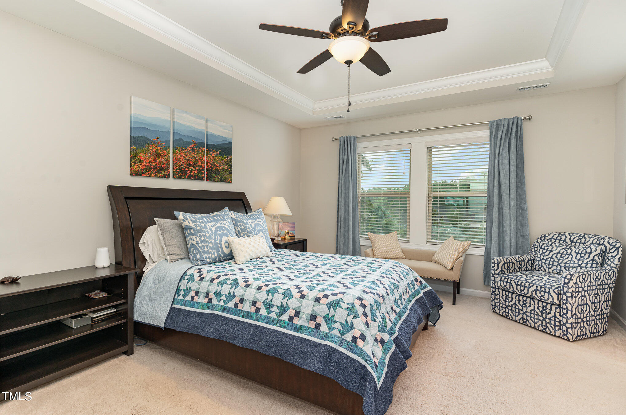 3405 Barn Road Apex, NC 27502 - Photo 20 of 38 a bedroom with a bed couch and window