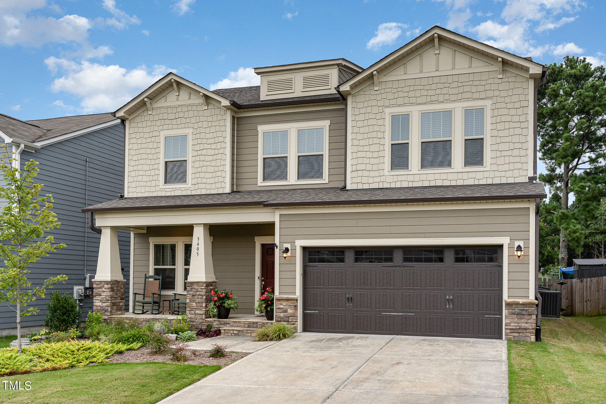3405 Barn Road Apex, NC 27502 - Photo 4 of 38 a front view of a house with garden