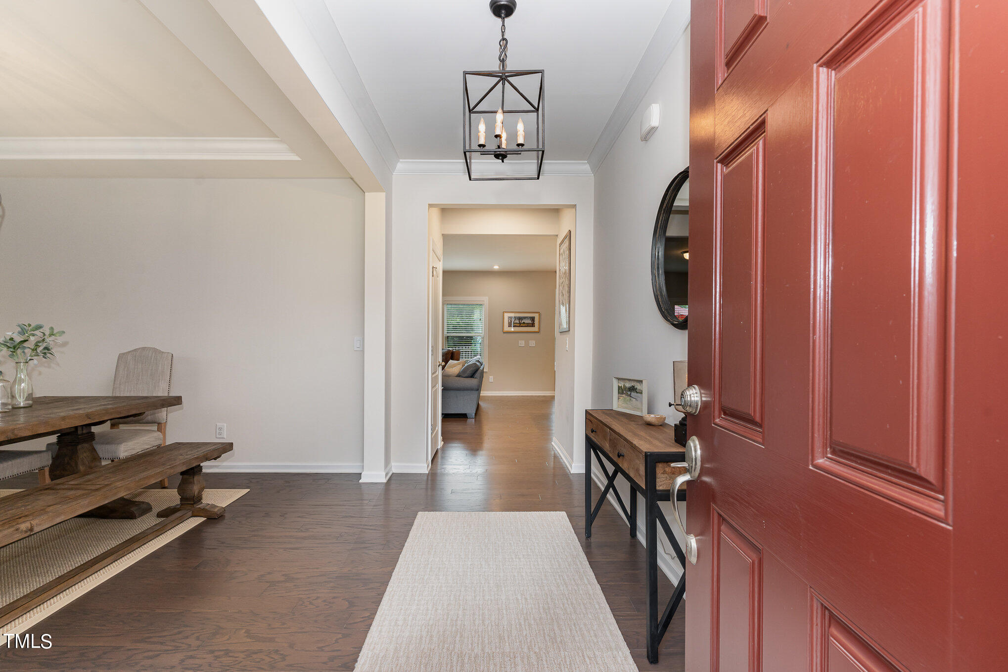 3405 Barn Road Apex, NC 27502 - Photo 6 of 38 a hallway with a stove oven a washer and dryer