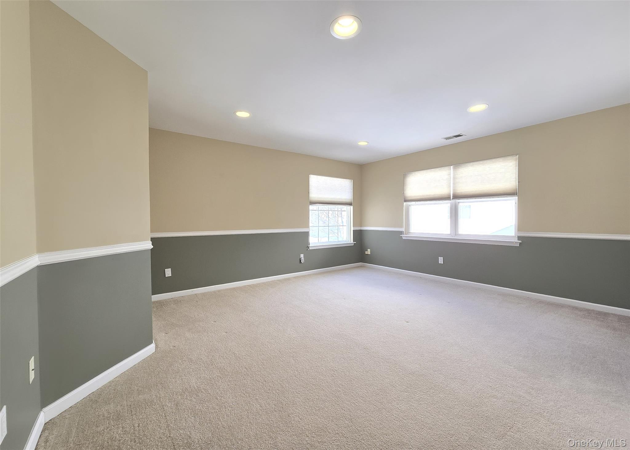 63 Sunflower Ridge Road Centereach, NY 11720 - Photo 13 of 23 an empty room with window