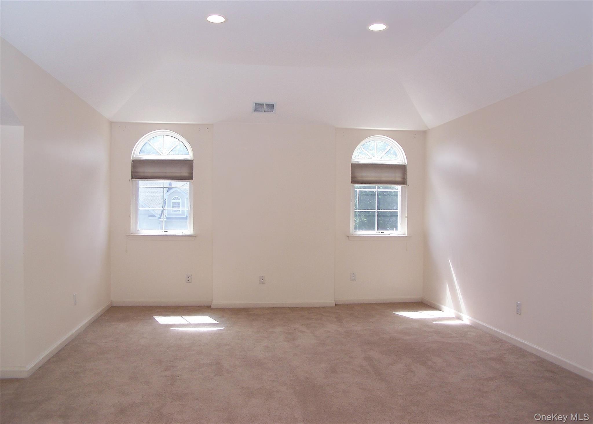 63 Sunflower Ridge Road Centereach, NY 11720 - Photo 10 of 24 an empty room with a window