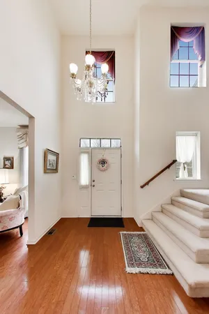 a view of a livingroom with wooden floor