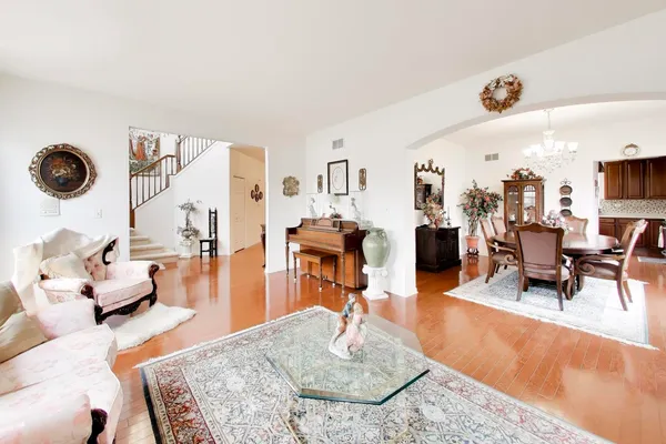 a living room with furniture and a table