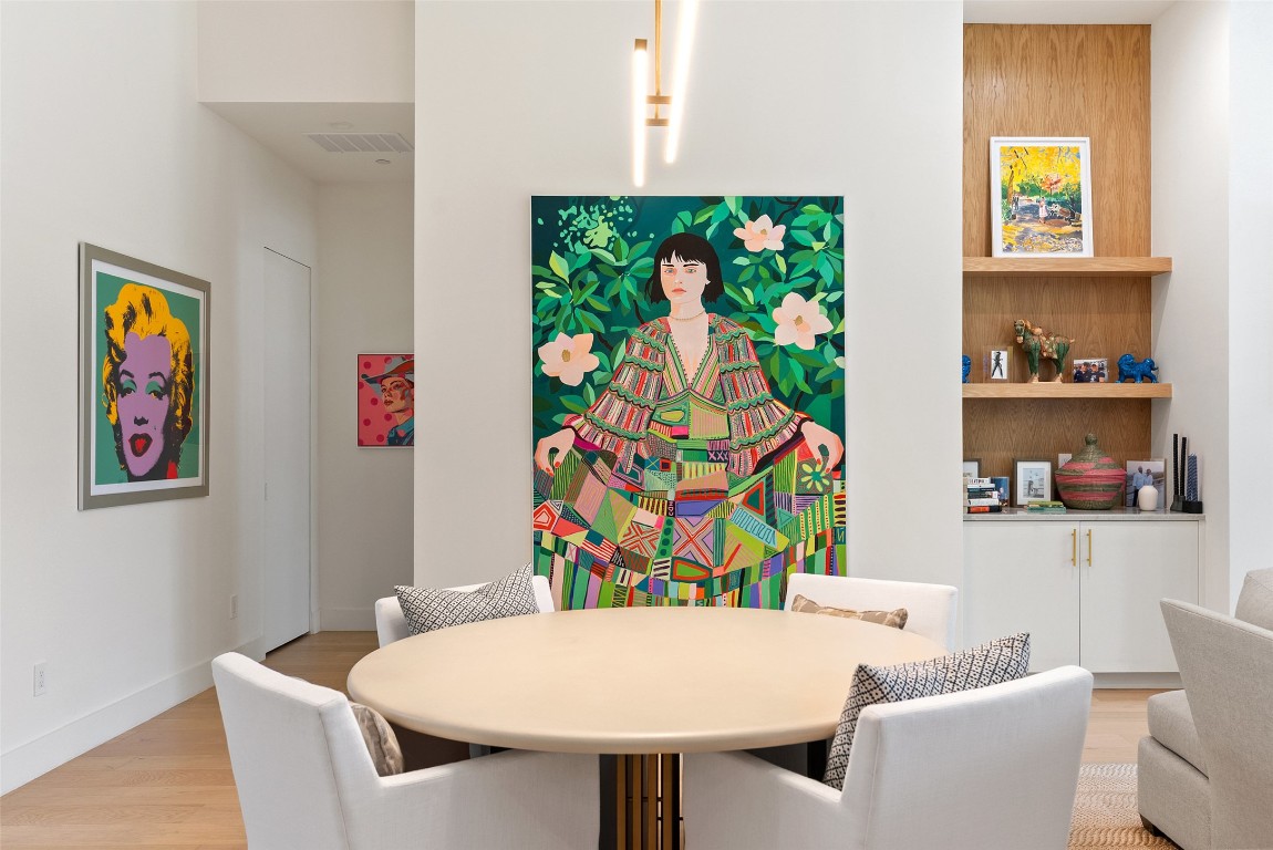 304 Blue Ridge Trail Austin, TX 78746 - Photo 18 of 40 a view of a dining room with furniture