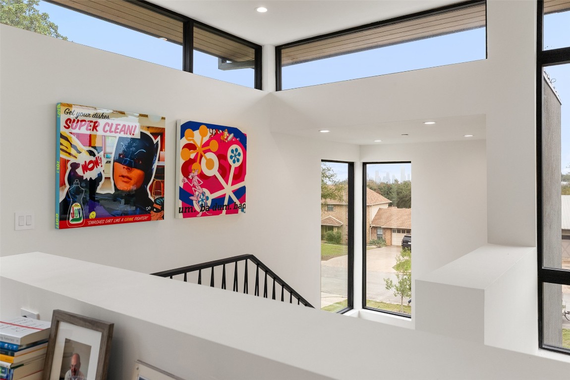 304 Blue Ridge Trail Austin, TX 78746 - Photo 26 of 40 a bedroom with furniture and window
