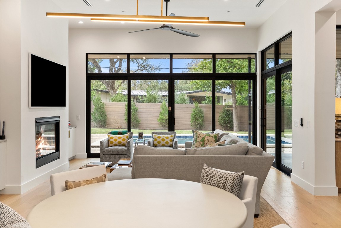 304 Blue Ridge Trail Austin, TX 78746 - Photo 7 of 40 a living room with furniture and a large window
