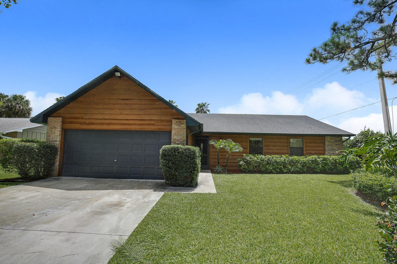 709 Weldwood Road Jupiter, FL 33458 - Photo 1 of 20 709 Weldwood Rd Jupiter FL-print-001-14-