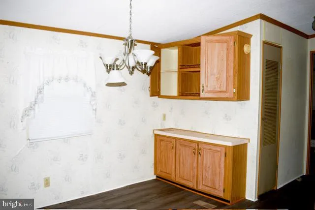 a bathroom with a sink a mirror and a shower curtain
