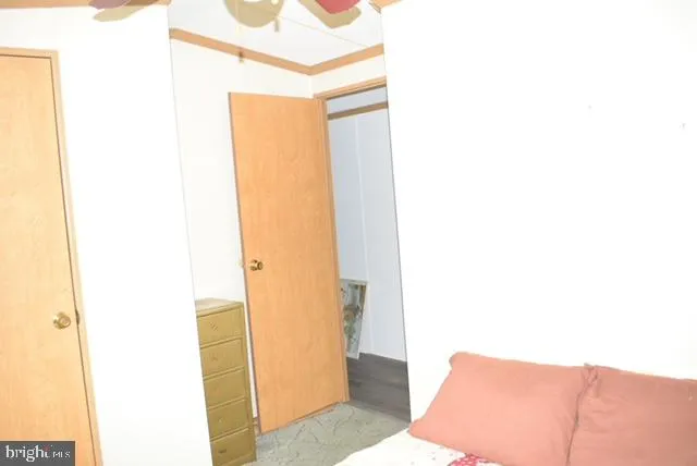 a living room with a bed