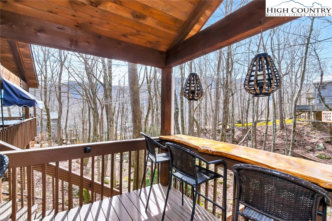 194 Woodwinds Circle Seven Devils, NC 28604 - Photo 11 of 50 a view of sitting area in balcony
