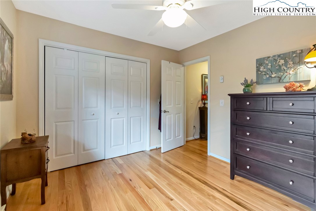 194 Woodwinds Circle Seven Devils, NC 28604 - Photo 36 of 50 a view of room with wooden floor