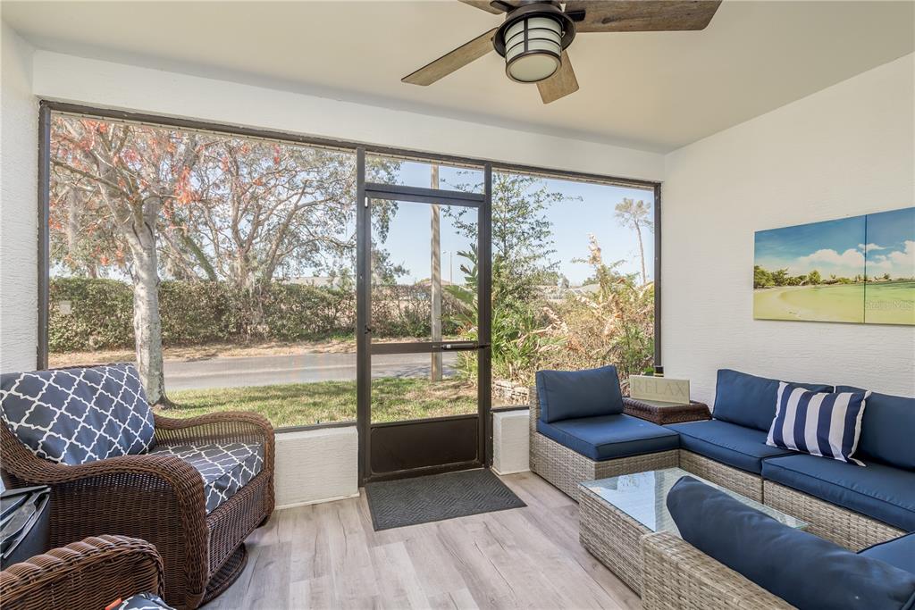 7536 Roland Court New Port Richey, FL 34654 - Photo 12 of 15 a living room with furniture and a large window