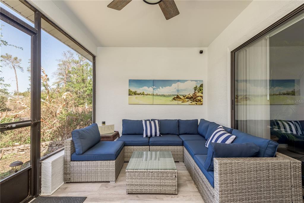 7536 Roland Court New Port Richey, FL 34654 - Photo 13 of 15 a living room with furniture and a large window
