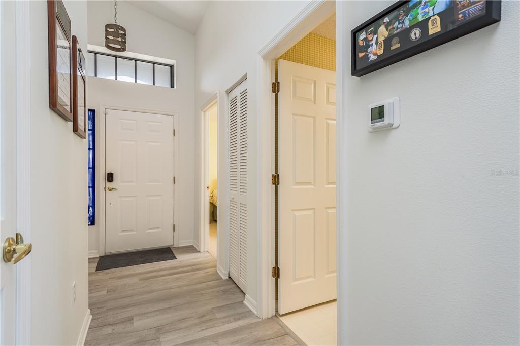 7536 Roland Court New Port Richey, FL 34654 - Photo 2 of 15 a view of a hallway with entryway door