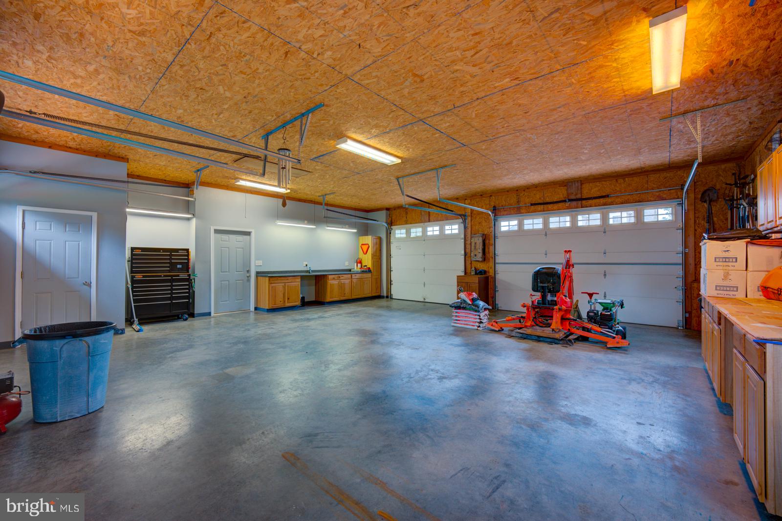 6542 Pine Stake Road Culpeper, VA 22701 - Photo 108 of 113 Spacious garage with ample storage.
