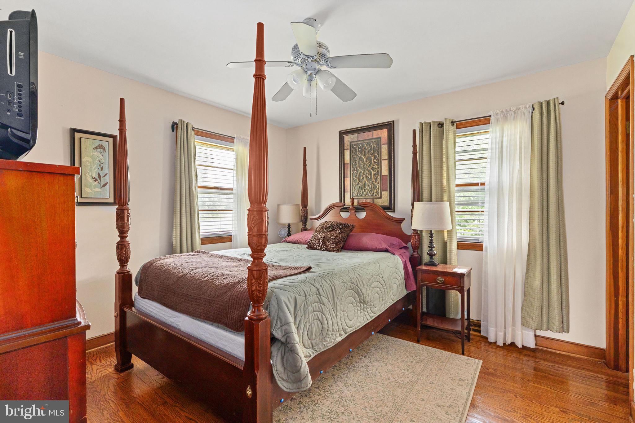 1440 Holly Farm Road Burkeville, VA 23922 - Photo 22 of 52 Charming bedroom with classic elegance.