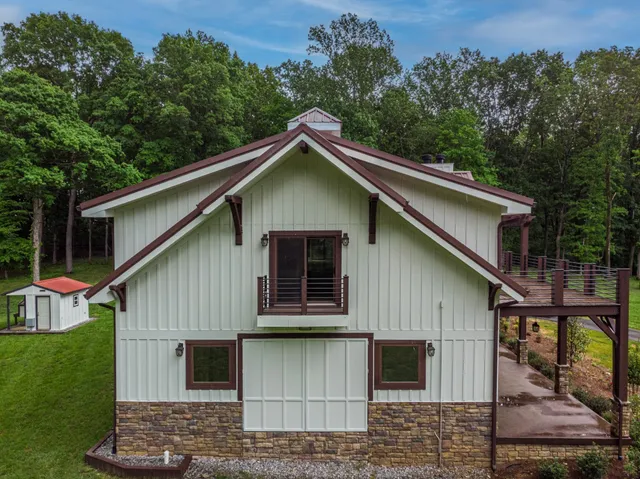 a house with trees in the background