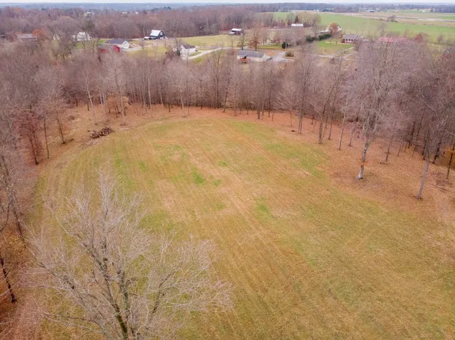 a view of yard covered with snow