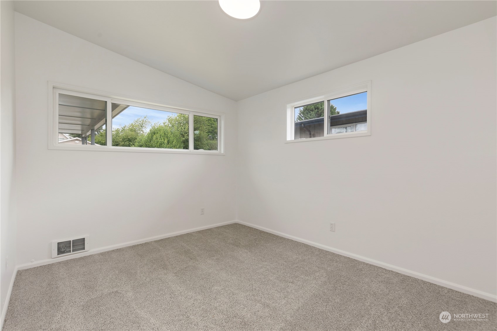 629 Monroe Street Monroe, WA 98272 - Photo 14 of 38 an empty room with windows