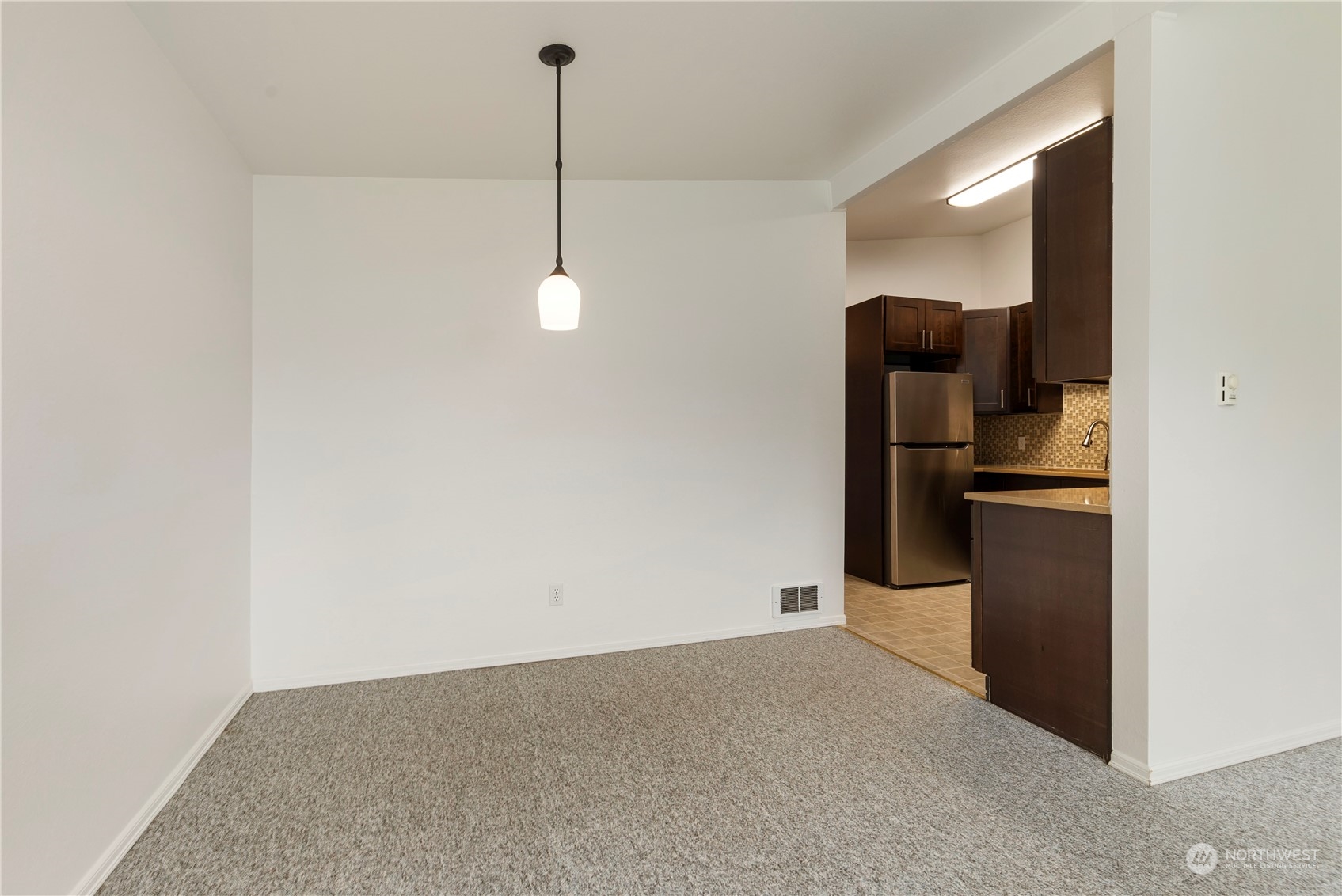 629 Monroe Street Monroe, WA 98272 - Photo 24 of 38 a view of an empty room with floor to ceiling window