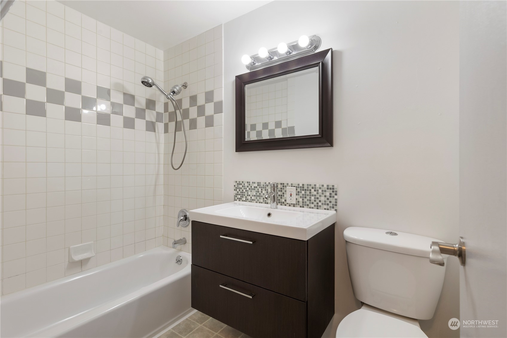 629 Monroe Street Monroe, WA 98272 - Photo 30 of 38 a bathroom with a toilet sink and mirror