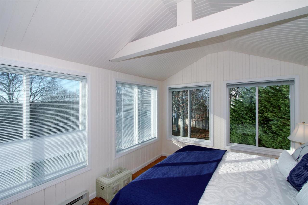 55 Barley Neck Road Orleans, MA 02653 - Photo 25 of 32 a living room with a large window