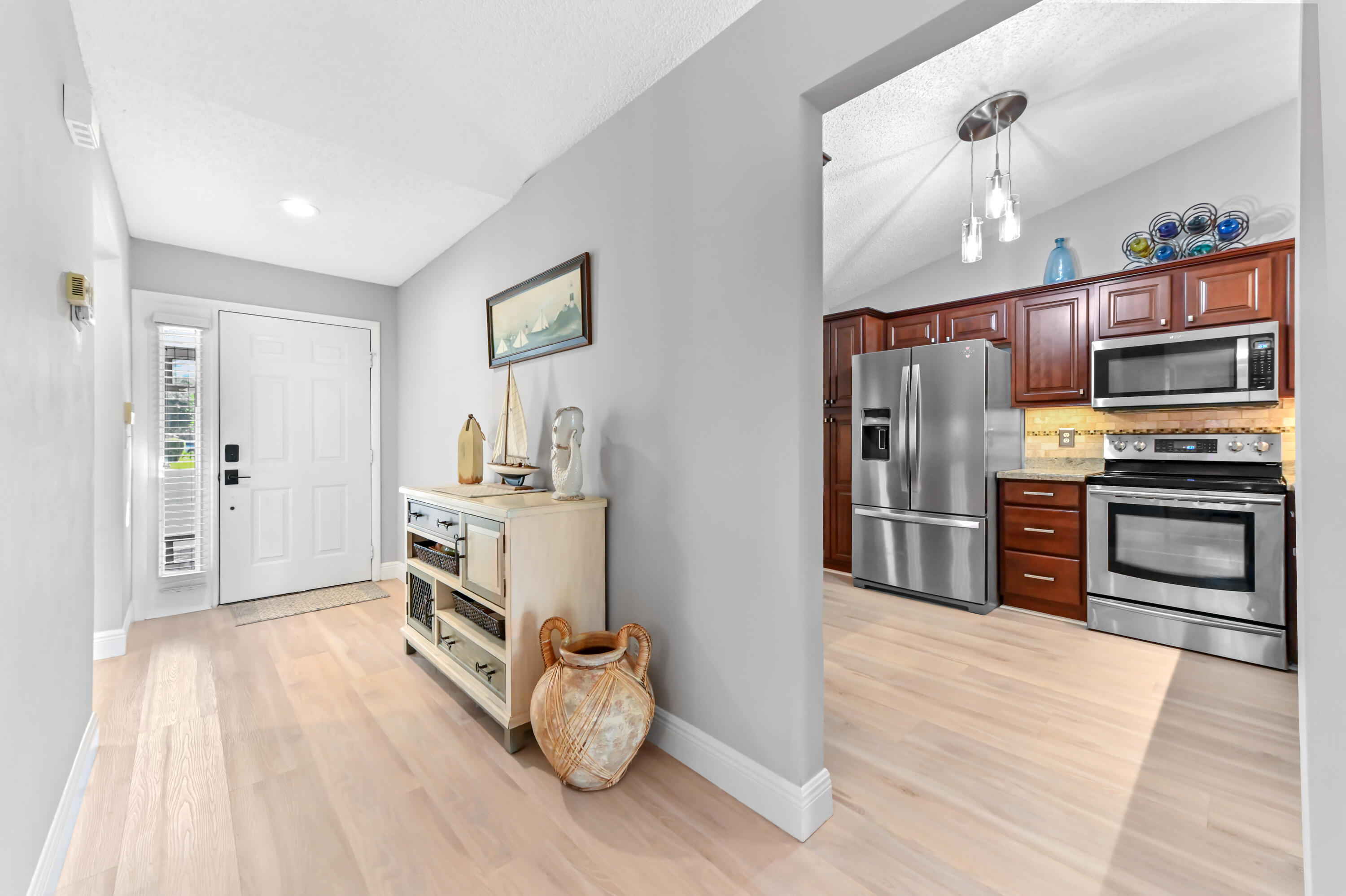 7615 Red Ruby Drive Delray Beach, FL 33446 - Photo 7 of 34 06 foyer 03