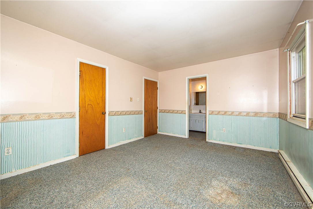 4612 Twelveoaks Road Midlothian, VA 23112 - Photo 12 of 22 an empty room with a kitchen