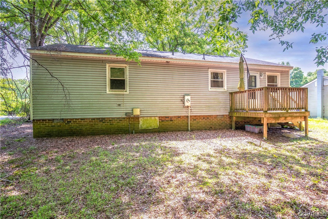 4612 Twelveoaks Road Midlothian, VA 23112 - Photo 19 of 22 a view of a house with backyard and chairs
