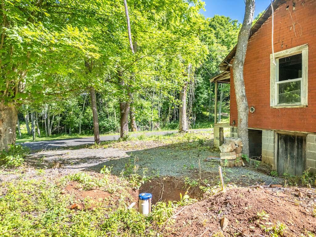 1199 Sanders Mines Road Max Meadows, VA 24360 - Photo 5 of 21 a backyard of a house with lots of green space