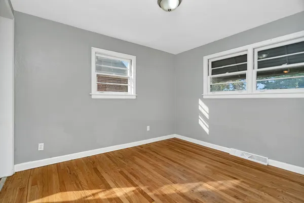 a view of a room with a large window