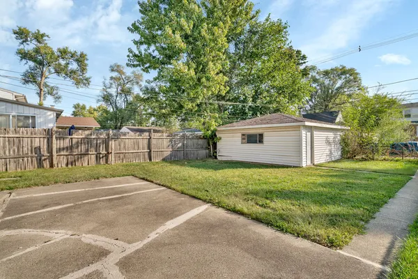a view of a back yard of the house